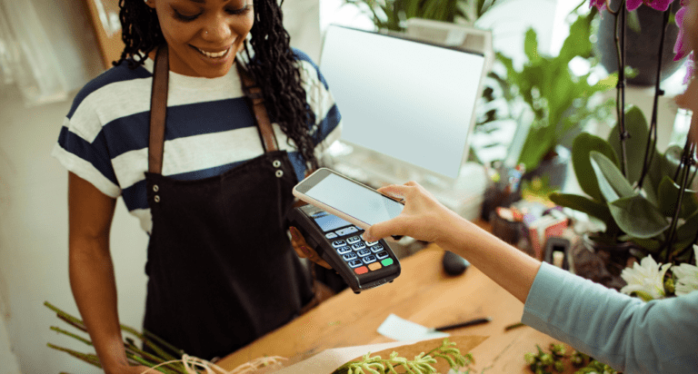 small business owner accepting a mobile payment