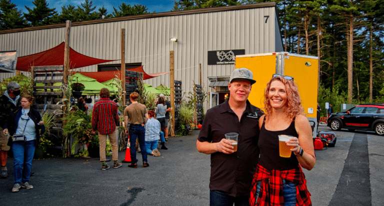 Erika Anderson and Jeff Mannion standing outside Unified Beerworks